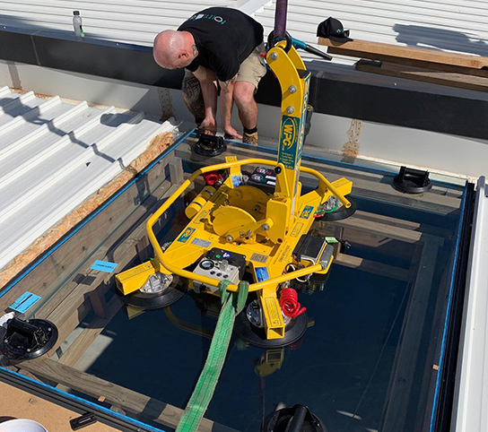 Installing large glass roof panel