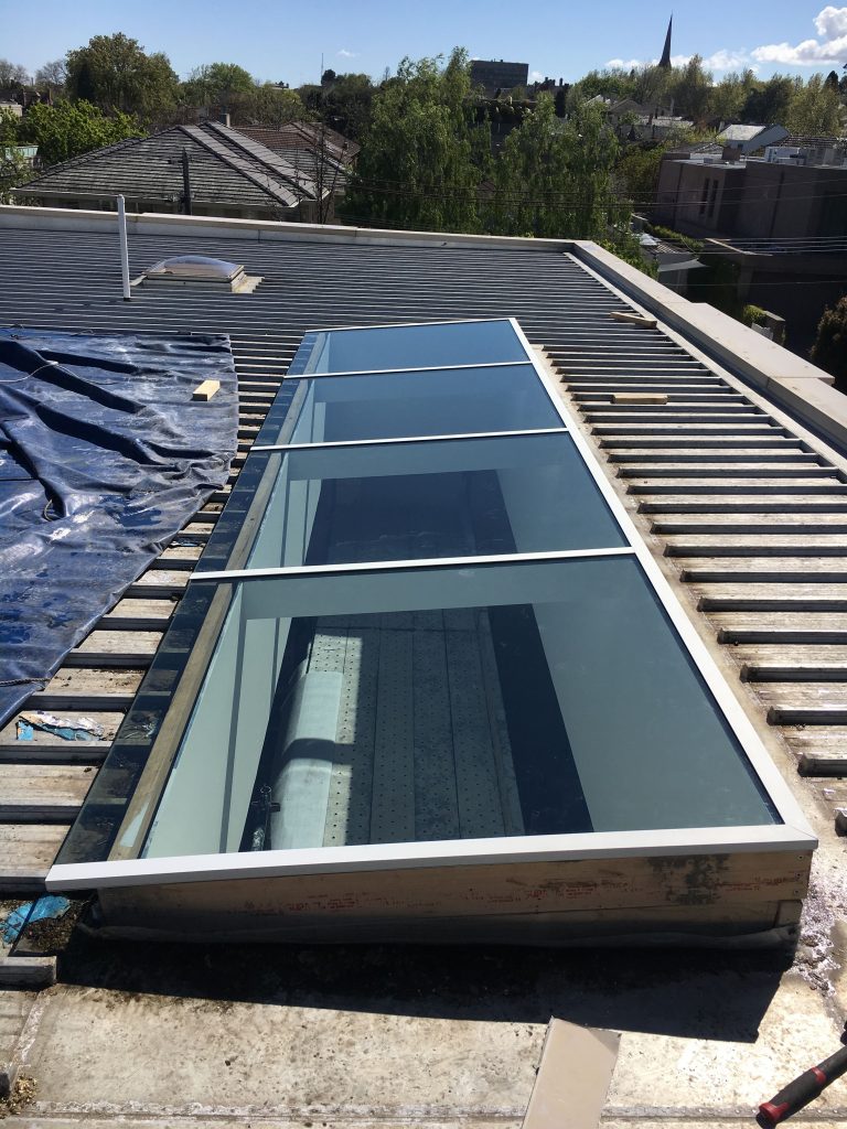 Glass roof panels